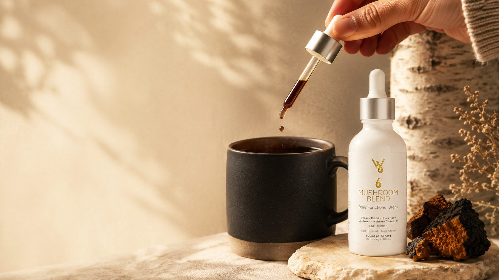 Functional mushroom drops being added to morning coffee beside a 6 Mushroom Blend bottle